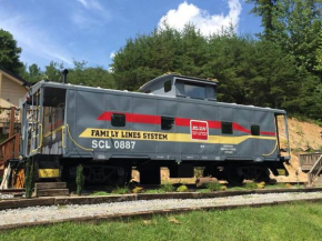 Seaboard Coastline #0887: Sleep in a caboose on a bison ranch